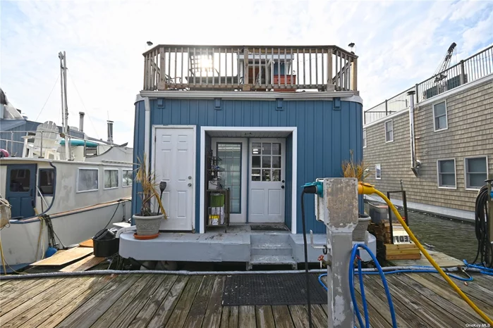 Thinking about living on the water? What a unique and great way to spend your life without the traffic to the Hamptons or the price of the Hamptons. This is a well-maintained and bright spacious housebarge for sale in Port Washington Long Island with dimensions of length 43ft long x 20ft docked at 10 Matinicock Ave, Port Washington. This houseboat offers mesmerizing views of the town of Port Washington a real Million Dollar View Sunset views on your 2BR, 1BA, HouseBarge where you can relax year-round after a long hard day of work. All the conveniences of home living without the price. You&rsquo;ll enjoy drinks on your 250 SqFt Top Deck that overlooks the beautiful town of Port Washington. This is a housebarge and you will be living on the water,  Owner Pays a Monthly Slip Fee of $1000