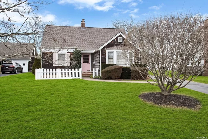 South Sayville Cedar Shaked Expanded Cape on a beautiful tree-lined street features a formal living room with built-in bookshelves and a wood-burning fireplace. The formal dining room with a swing door to the butler&rsquo;s pantry offers plenty of storage and gains access to the kitchen. Two bedrooms on the first floor, both overlooking the backyard, the second floor offers a bedroom plus a bonus room (with w/no heat), and same level huge attic to explore all opportunities within. Bonus part finished basement and unfinished area are both accessible inside and outside through steel double Bilco doors. The expansive backyard and one in a half car garage finish this great find in South Sayville.