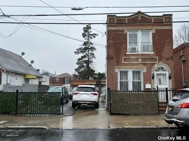 Beautiful and Spacious detached 2-Dwelling Brick House in East Elmhurst with 3 cars garage and driveway for 4 additional cars (total of 7 cars). Full finished high ceiling basement with laundry space, 2 full baths and separate outside entrance. 1st Floor with two separate front and side entrances, 3 bedrooms, 1 full bath, kitchen and living room. 2nd Floor features 3 bedrooms, 1 full bath, kitchen and living room