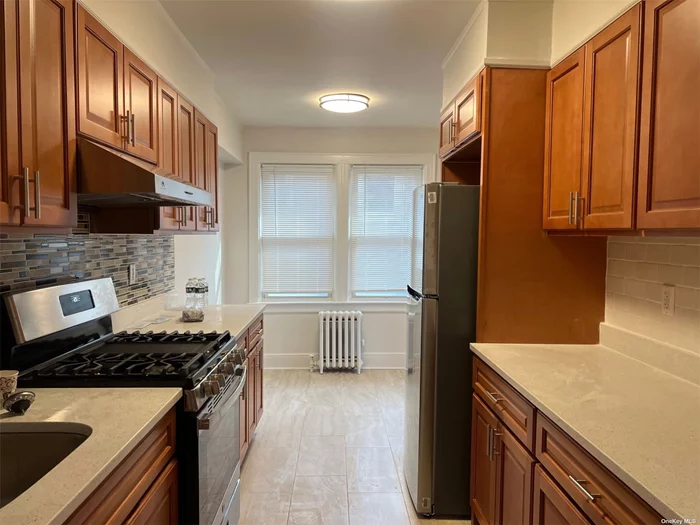 Bright New Renovated Spacious 2Bedroom, Large Living Room And Dining Area With Walk Through Kitchen. Two Bedroom With Storage Spaces. 2Blocks Away To The Library On Northern Boulevard And 3Minutes Walk To Long Island Railroad Station On Bell Boulevard With All Restaurants And Shops. Close To All