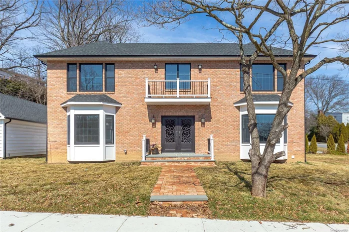 NEW CONSTRUCTION. Brick Colonial. Southern Exposure. 4 Bedrooms, 2.5 Baths. Open Flow- Great For Entertaining. Approximately 2, 500 Sq Ft Plus Full Basement, Roslyn Schools, Close To All!