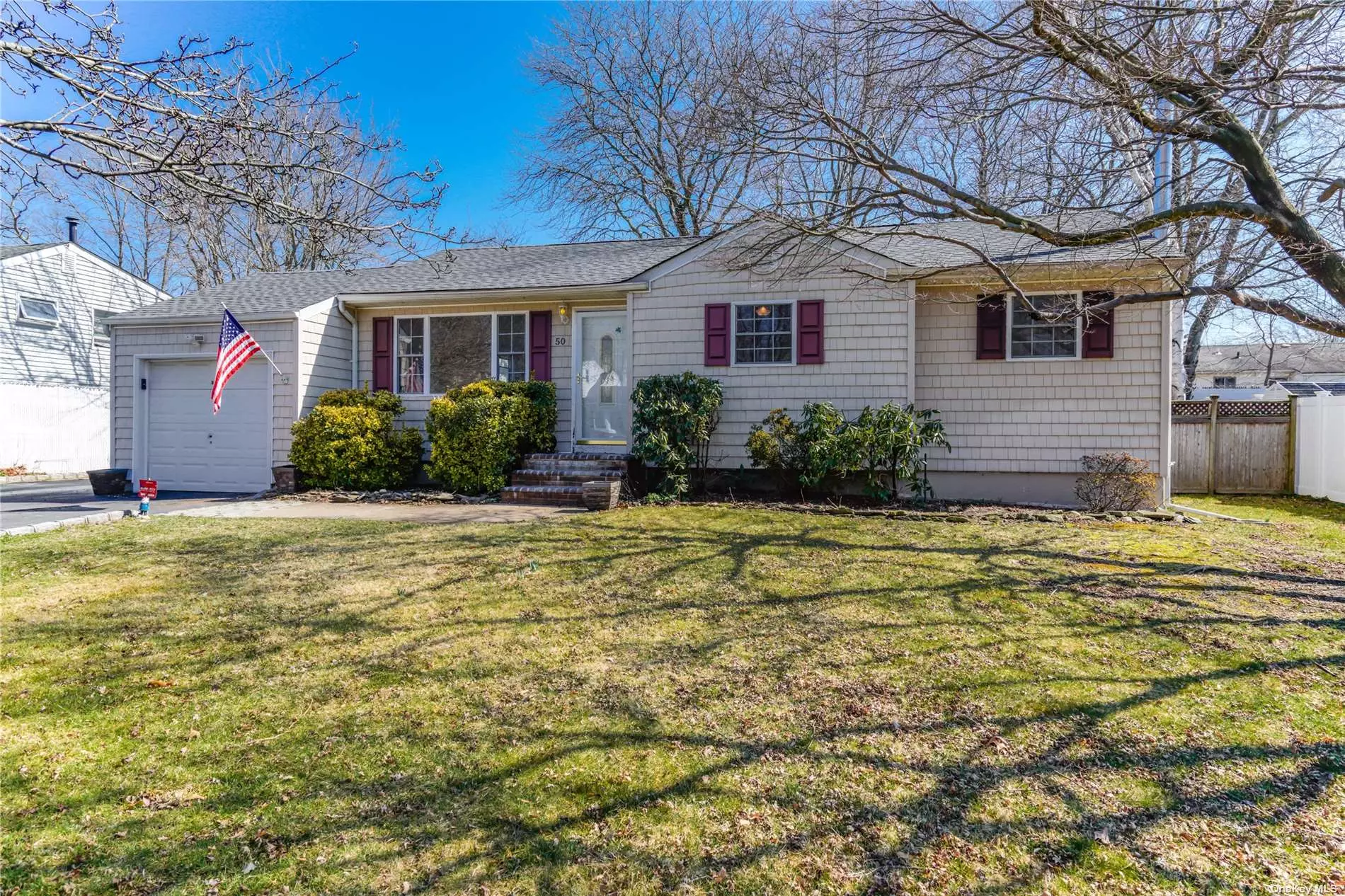 BEAUTIFULLY RENOVATED RANCH: FEATURES SPACIOUS LIVING ROOM, NEW KITCHEN WITH WHITE SHAKER STYLE CABINETS, GRANITE COUNTER TOPS, STAINLESS STEEL APPLIANCES, 3 BEDROOMS, 2 FULL BATHROOMS, FRESHLY PAINTED, HARD WOOD FLOORS THROUGHOUT, CENTRAL AIR CONDITIONING,  FULL BASEMENT WITH FULL BATH, WOOD BURNING STOVE, BRAND NEW ROOF, 1 CAR GARAGE, DOUBLE WIDE DRIVEWAY, FENCED YARD, FRESH AND READY TO GO!