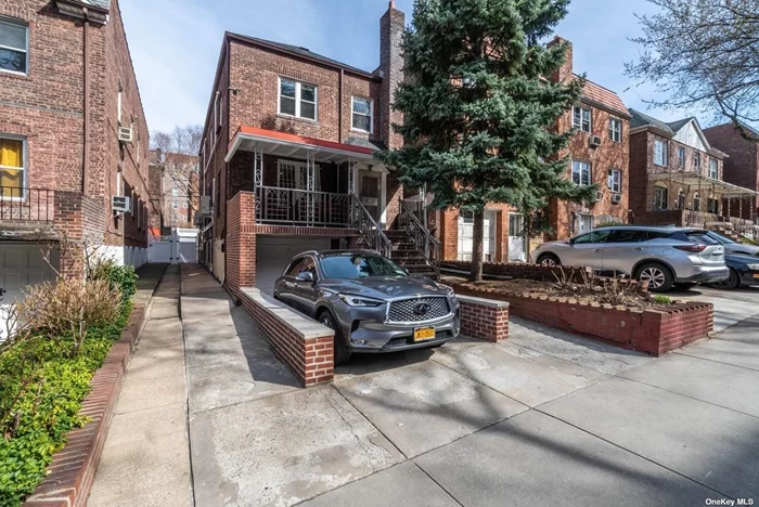 Rare, detached brick 3 family home in the heart of historic Jackson heights. Mint, High-end renovations. absolutely move in condition. High ceilings large rooms. Close to shopping, schools, subway, bus, house of worship. Pvt driveway and one car garage.