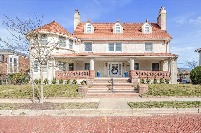 The Gold Coast Meets The City by the Sea, Less than 1 Hour from Manhattan! This Rare 1900&rsquo;s Historical Mini Mansion is Situated on a Sprawling 100x100 Lot in the Historical Red Brick District. Over 100 Years After it was Built, the Original Interior was Gutted & Rebuilt by One of the Most Respected Builders in the Industry. This 7 Bedroom (4 Ensuite) & 6 Full Bathroom Home Maintains Old World Charm w/ Modern Amenities. Features: Grandiose Covered Front Porch, An Extravagant Entry with Foyer Boasting 20 ft. Ceilings, Elegant Dining Room with Custom French Doors, Formal Living Room w/ Fp, Family Room w/Fp & Sunlit Gatsby Style Room. Chef&rsquo;s Gourmet Kitchen w/Professional Appliances, Quartzite Counters & 9 ft. Island. Luxurious Primary Suite has an Adjoining Circular Sitting Room & Spa-like Bathroom. Large Rear Deck, Expansive Yard w/Room for a Pool, Private 4 Car Driveway & 2 Car Garage. Minutes from Beautiful Beaches, Long Beach&rsquo;s Famous Boardwalk & LIRR. Coastal Living at its Finest!