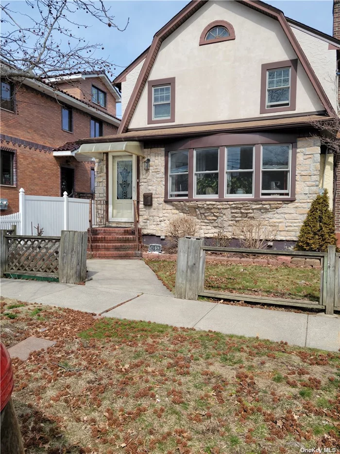 Rare Find R3A zoning in Whitestone, Long driveway , 2 Car Garage, Deck off Eat in Kitchen , Separate entrance to basement, Convenient to Transportation & Shopping , Hardwood Floors, Wood Burning Fireplace.