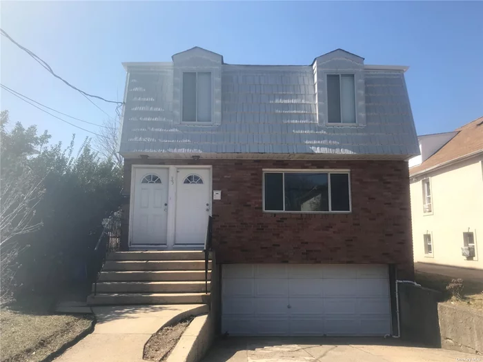 Freshly painted Sunny, 1st floor 2 Bedrooms, 1 Bath, Brand new Kitchen, LR & DR, all hardwood floors throughout. Brand new W/D, and 1 off street parking. Tenant pays all utilities.