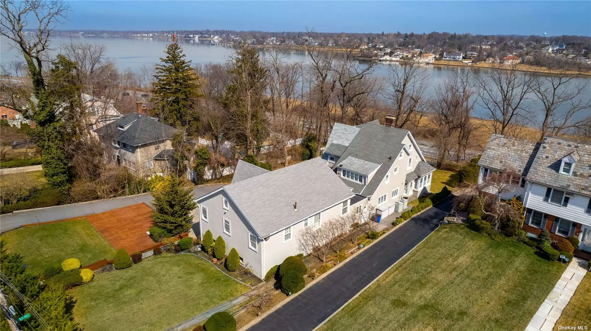Magnificent Property On 23, 000 Square Feet (103.30 x 228), Overlooking Little Neck Bay With A Legal IN-LAW SUITE (Separate Entrance) & POSSIBILITY TO SUBDIVIDE PROPERTY. Main Residence Has 3 Bedrooms, 2.5 Bathroom, EIK, Living Room, Dining Room, Sun Room & Water Views From Most Rooms; In-Law Suite Has 2 Beds, 2 Baths, Kitchen, LR/DR. 3 Car Garage. Close To All!
