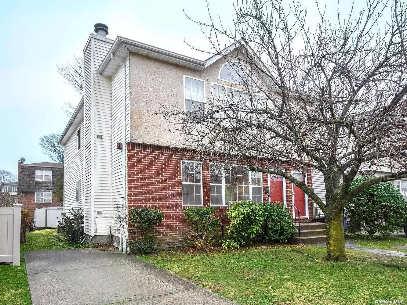 Spacious two-family house in waterfront community! Great for investors or end users. Each unit features 3 bedrooms, 2 full baths, L-shaped living/dining room with fpl, eat-in-kitchen, hardwood floors, CAC. First floor unit has a huge full finished basement for playroom, laundry and utility. Second floor unit has high vaulted ceilings, skylights, and laundry in the apartment. Total of 3 car driveway parking.