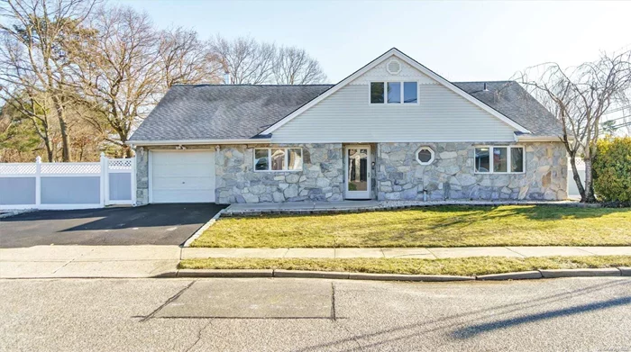 A beautiful multi-generational home located on a corner lot with northern exposure. This home boasts 5 bedrooms and two baths. The main floor has a master bedroom with a walk-in closet and access to a full bath and 2 additional bedrooms with multiple large windows. The entry foyer leads to an expansive living room with a large bay window overlooking the backyard. Den, dining room, and kitchen have an open concept layout which is great for entertainment and have recess lighting. Kitchen features Victorian-style cabinets, a Gas stove, and stone countertops. Den with wood burning custom-built fireplace has French doors leading to a fully fenced backyard. Second floor has an additional 2 bedrooms. Additional kitchenette with stove and refrigerator. The second floor has a private outside entrance. Home has many energy-efficient features such as foam insulated vinyl siding, attic space with blown insulation, dual panel windows, wall hanging Gas boiler, and 4 mini-split ACs.