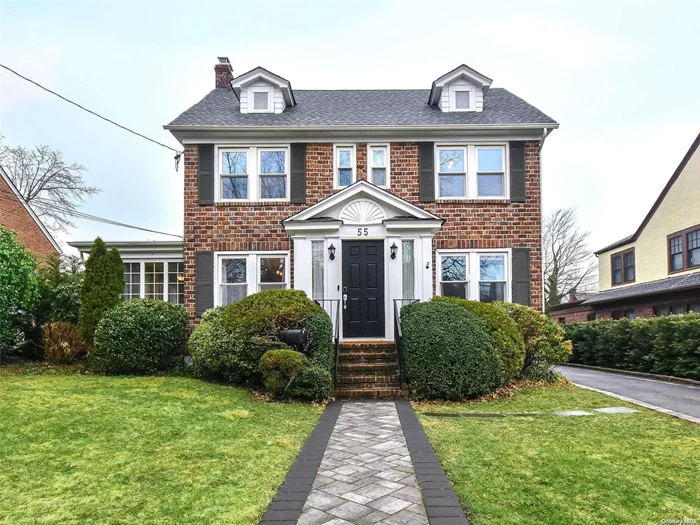 Commuter&rsquo;s Dream! Sunny Brick Center Hall Colonial in mint condition. Boasting a great flow, this home features an Enclosed Front Foyer, a Formal Living Room with gas fireplace, double French doors that lead into a side Den/Home Office surrounded by windows adding even more light. Formal Dining room, Gourmet Eat-in Kitchen with an island, granite counter tops, stainless steel appliances, Full Bath, and a back door that takes you to a private nicely landscaped backyard including a large entertaining patio and pergola. Second floor includes a Master bedroom, plus 2 additional bedrooms, and Full Bath. Spacious walk-up attic, with great natural light. Full basement, laundry, and storage. 2 zone CAC, gas cooking and heat, new roof, new windows, new hot water heater, sprinkler system and beautiful walkways. Detached one car garage. Close to town, schools, and railroad.