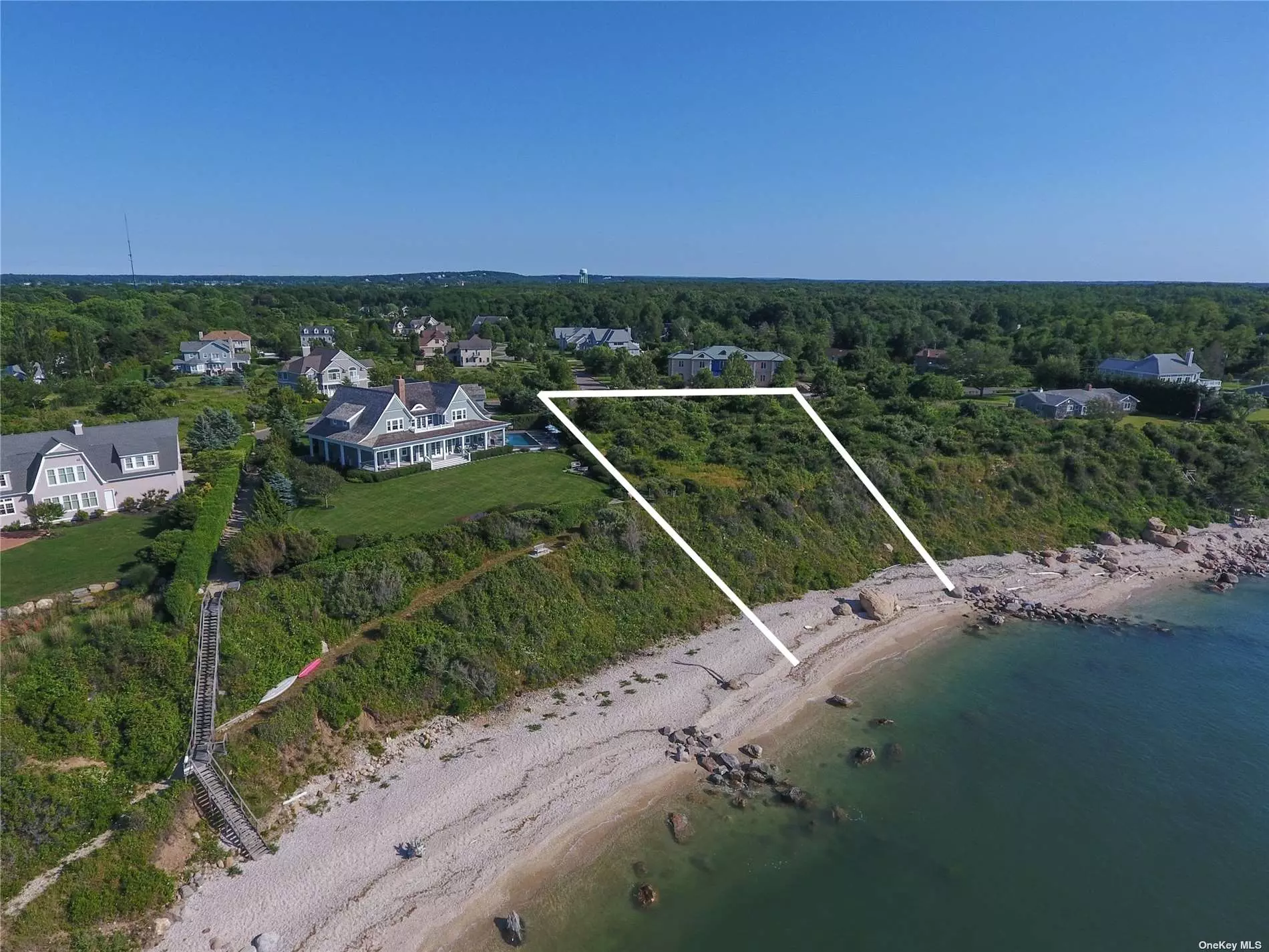 Greenport, Rock Cove Estates--One of only two sound front lots available in this premier, well-established community. 1.22 acres level parcel with sweeping water views across the LI Sound to the Connecticut shoreline. Extraordinary sunsets. 163 feet of private sound beach. Build the home of your dreams to enjoy the gentle sea breezes and the sound of waves hitting the shore. An enclave of beautiful homes amidst the bucolic North Fork Wine Country. Greenport Village is just a bike ride away. Vineyards, farm stands, shops and restaurants. A prime location that has it all. This is it, and it&rsquo;s waiting for you.