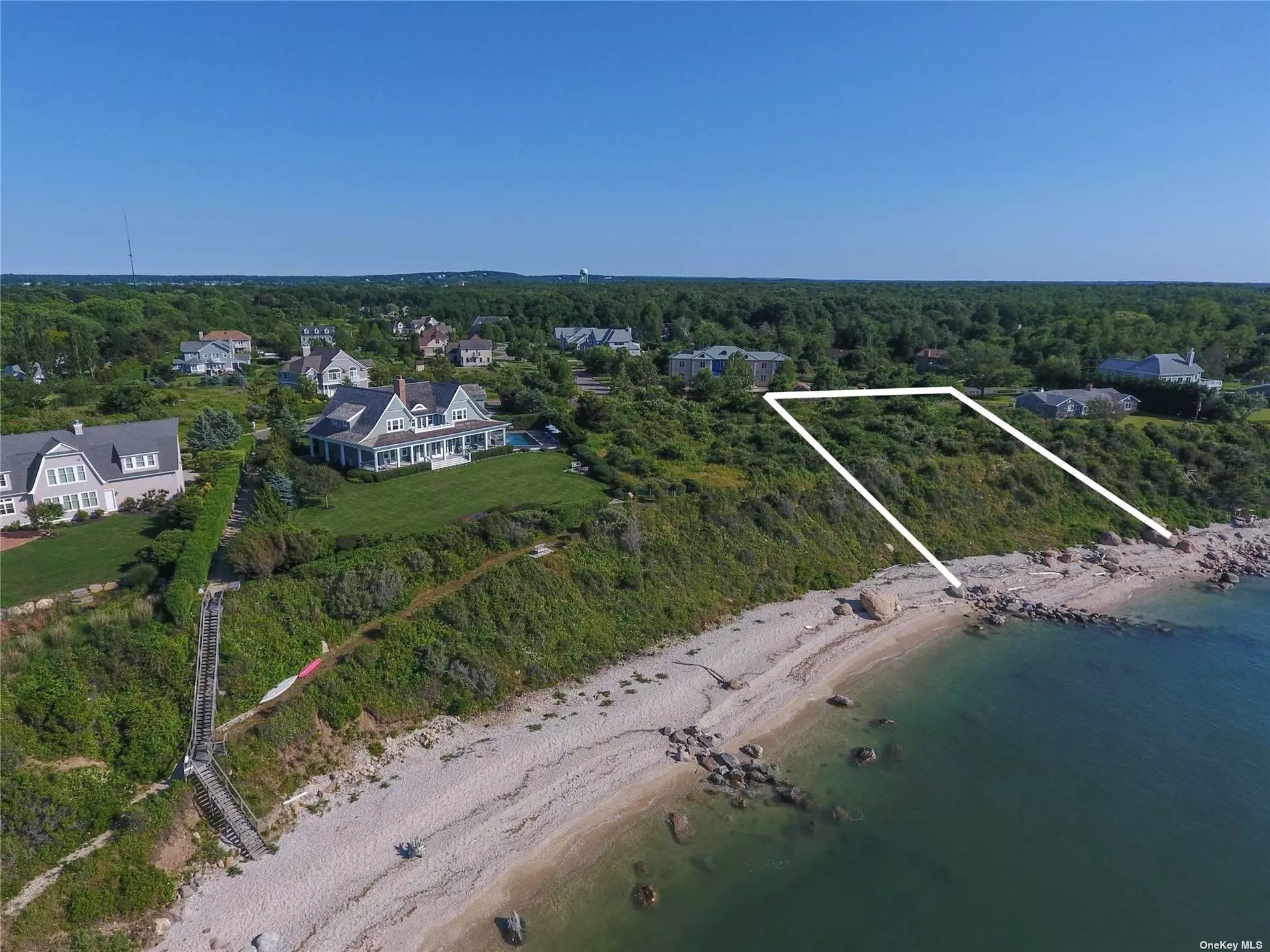 Greenport, Rock Cove Estates--One of only two sound front lots available in this premier, well-established community. 1.06 acres level parcel with sweeping water views across the LI Sound to the Connecticut shoreline. Extraordinary sunsets. 152 feet of private sound beach. Build the home of your dreams to enjoy the gentle sea breezes and the sound of waves hitting the shore. An enclave of beautiful homes amidst the bucolic North Fork Wine Country. Greenport Village is just a bike ride away. Vineyards, farm stands, shops and restaurants. A prime location that has it all. This is it, and it&rsquo;s waiting for you.