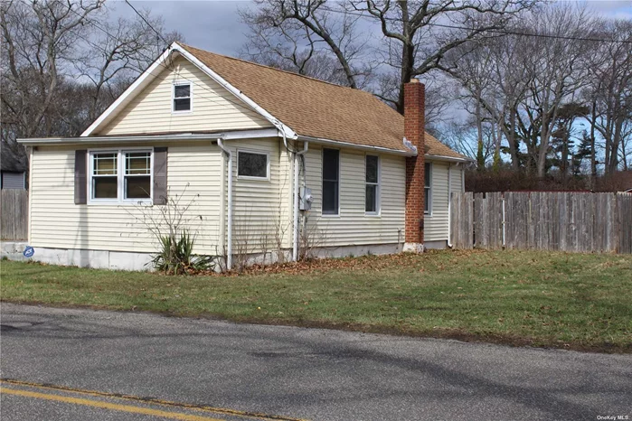 Tons of possibilities with this property. 2 bedrooms 1.5 baths. EIK, LR, Sun Room, laundry room. Huge stand up attic , big property fenced in. Verified taxes $4858.25. Furnace 1.5 years old. Dryer and stove connected to propane recently. Appliances are a gift.