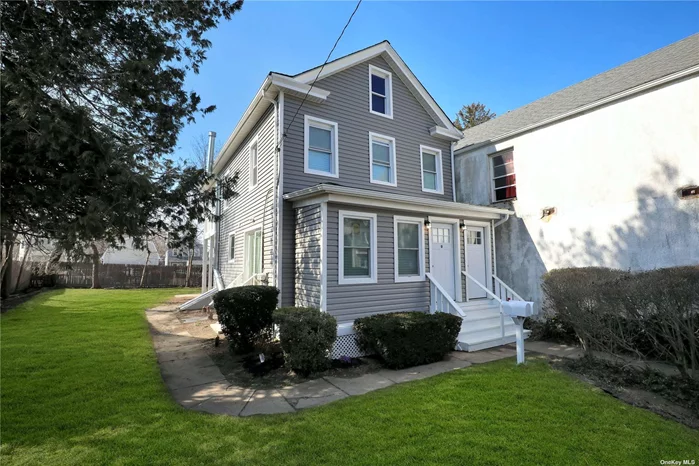 WOW! This DIAMOND COMPLETELY RENOVATED LEGAL 2 FAMLY HOME is IDEALLY LOCATED in the Heart of Oyster Bay w/Easy Access to the Beach, Shopping, Dining, & LIRR (Transportation). TAXES ONLY $5, 995. Gleaming Hardwood Floors Throughout Both Units. Each Unit Has 2 Spacious Bedrooms, A Beautifully Designed Full Bathroom & Open Concept Kitchen Area,  Both Stunning Kitchens have Quartz Counter Tops, Brand New Stainless Steel Appliances, Gas Cooking & Gas Heat. Lower Unit Features a Fabulous Walk Out Basement & Sliders Off the Kitchen to the Very Spacious Side Yard with Plenty of Room For Entertaining. Upper Unit Has a Large Storage Attic and Balcony off the Kitchen. This Fabulous Home Also Features 2 Brand New Heating Systems and 2 Brand New Hot Water Heaters, Nest Thermostats, & 2 Gas Meters & 2 Electric Meters. This Is a MUST SEE TRUE 2 FAMILY HOME!!