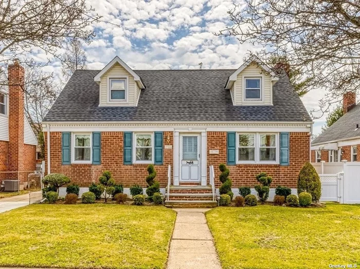 Expanded Cape in New Hyde Park and close to everything. This rear-dormered cape has 4 bedrooms, 2 bathrooms and Full Basement with Outside Entrance. With all the space you need, this home is ready for you to customize. The First floor features hardwood floors under the carpet, a spacious living room, and formal dining room. A primary bedroom can be located on the first floor or the second. The 2nd floor could be two bedrooms or more, with the possibility of a Large Primary Bedroom Suite. There is a full bath on each floor and a 1/4 bath in the basement. The full basement has an outside entrance and plenty of room for additional living space. An oversized detached one car garage sits at the end of the driveway. A must see home with limitless potential. Possible Mother-Daughter with proper permits.