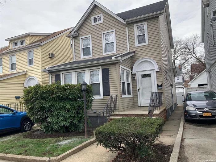 Bright and sunny, well maintained, detached Colonial in prime NE Bayside. Near to shops, restaurants, LIRR, schools and parks. First floor features beautiful parkay floors in LR and FDR. A bright and airy sun porch just off the LR, can be used as an office or a den, The kitchen is eat in and boasts a full bath in the hall. The second floor has 3 bedrooms and a full bath with stairs leading to an unfinished attic. The basement is freshly painted and open and unfinished. The heat is gas, the school district is 26, hardwood floors as seen