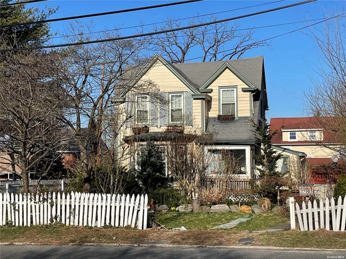 Bright & Sunny, Detached Colonial Renovated, Lot Size 50X100 Corner Prop. Zoning R2A, the First Floor Offers a Living Room, Formal Dining Room, Updated Eat-In Kitchen, and Half Bathroom, Hardwood Floors, Large Porch can be used as an Office, Central Air Conditioning, One Split AC, and Detached Garage with Private Driveway plus Nice Deck for BBQ, Gas Boiler and Separated Hot Water Tank, an Unfinished Basement. The Second Floor Has Three Bedrooms and a Full bathroom. Stairs to an Unfinished at Attic. Two Blocks to Crocheron Park, Close to School, Close to Shops