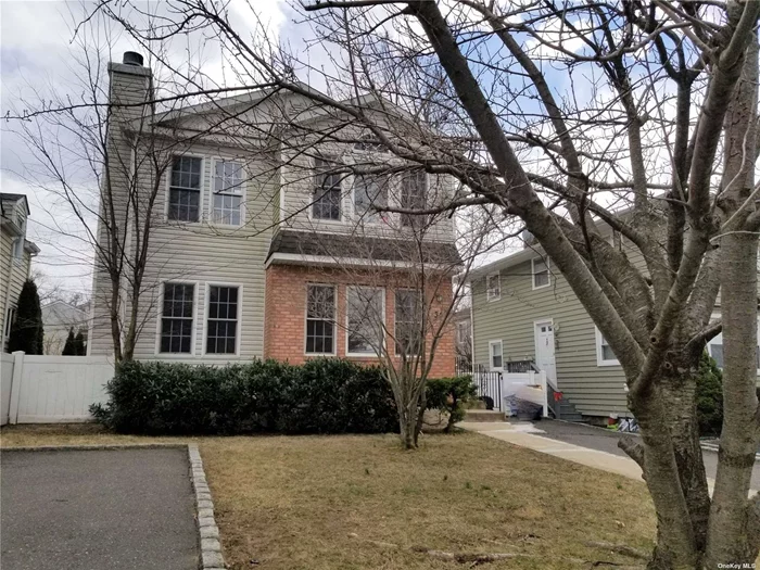 Beautiful 3BR x 2 full bath apartment in the Manhasset Isle section of Port Washington. Sunfilled living/dining room w/fpl, kitchen w/newer appliances, primary bedroom w/bath and sliders to backyard. Full finished basement with outside entrance for playroom/office, laundry, and utilities. Freshly painted, wood floor just refinised. CAC, driveway parking for 2 cars. Shared use of backyard.