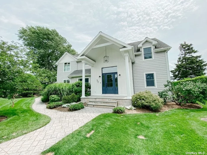 Sparkling Nantucket Style Bayfront Farmhouse with heated gunite pool with bluestone patio and firepit. Celebrate July OR August with your family in this pristine and spacious modern home on the beach. Jump in your kayak and paddle the Great Peconic Bay as you explore the shore and coastline. Elegant Primary Bedroom with balcony on the bay and with exquisite ensuite bath. 3 additional bedrooms, 2.5 additional baths. Experience the beautiful North Fork and all it has to offer from the farmstands to the vineyards and many fine and casual restaurants.