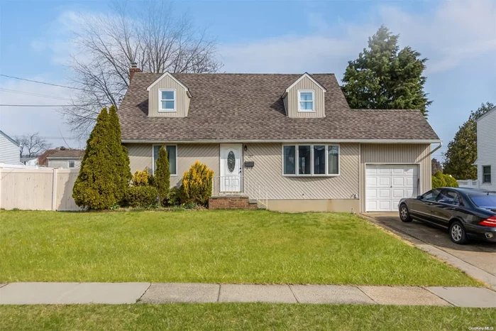 Wide Line Expanded Cape Sits Mid Block on Dead End Street. This Home Features 4 Bedrooms,  2 Full Baths, Kitchen, Living Room with Dining Area, Full Finished Basement, Natural Gas For Heating & Cooking. Large Fully Fenced Yard and 1Car Attached Garage with Attic for Storage. Great Location. Bring Your Imagination & Power tools & Make This House Your Dream Home.