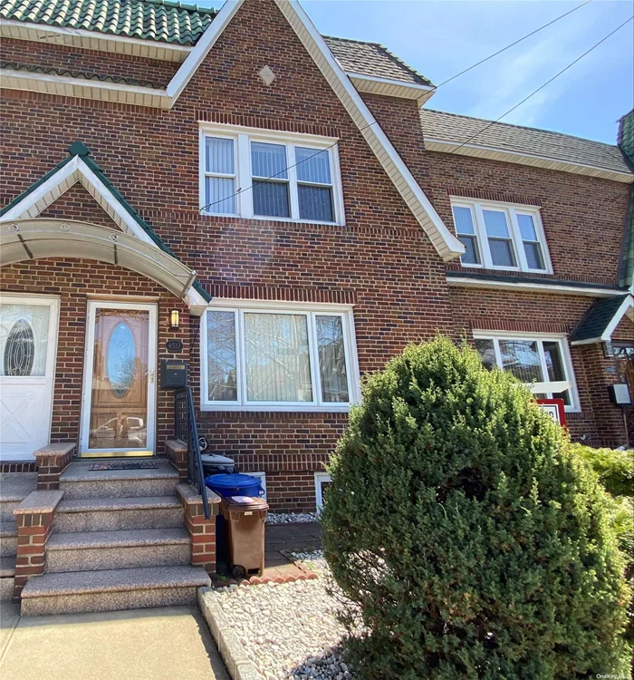 Bright and airy. This mint condition 3 bedroom home features an updated kitchen, stainless steel appliances, ample storage, serene & private backyard, and a washer/dryer. 1 parking spot, heat, and water are included. Conveniently located to LIRR, transportation, restaurants, shops, and School District 26.