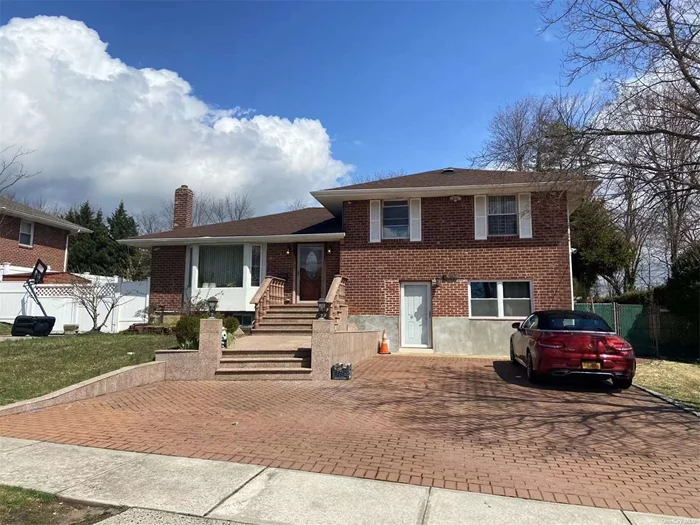 Fully Updated Brick 5 Bedroom/4 Full Bath Split with The Desirable Robbins Lane Area of Syosset. Perfect Mid-block Location! Expanded Eat-in Kitchen w/ Wood Cabinets, Gas Cooking, Great Counterspace & Storage! Finished Basement w/ Rec Area & Tile Fl. Large PVC Fenced-in Yard w/ Updated Gunite Heated IG Pool; Perfect for the summer and entertaining. CAC, Pristine Oak wood Floors! Close to transportation, shopping, gym, library, schools & all! Quiet neighborhood. Hard to find & must see to appreciate!