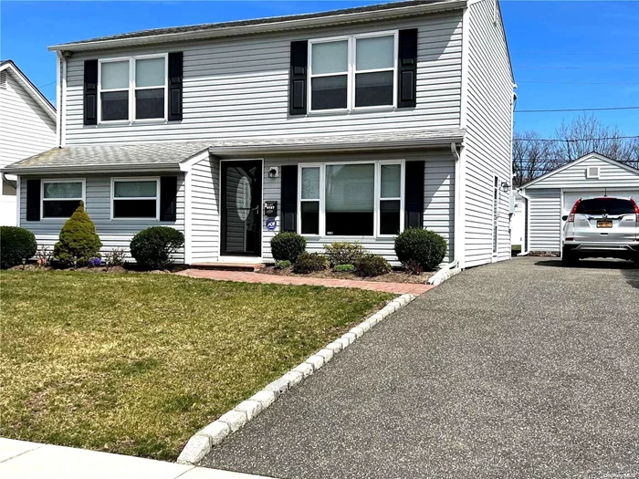 This Beautiful Colonial In Plainedge SD 18 Was Renovated 10 years ago. This Lovely Home Features A Formal Living Room, Dining Room, Or Den. Open To Your Eat-in-Kitchen Which Features Granite Countertops, Center Island & Stainless Steel Appliances. There are 2 Beautifully Tiled Full Baths In The House, One On The First Floor And The Other On The Second Level.. This Upper Level Also Features A Master Bedroom, Plus Three Additional Bedrooms. The Long Driveway Can Accommodate 3 Cars And Leads To A Spotless 1.5 Car Detached Garage. A Morning (East) Exposure And Western Sunset Offers Light And Bright Rooms And A Sun filled Private Backyard. This Home Is Close And Easily Accessible To Stores And Parkways. Hurry Before It&rsquo;s Gone... Truly Mrs. Clean Lives Here!