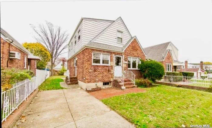 Fantastic Two Family House in Bellerose, Queens. Great Rental Income, Top Rated School District 26. Main Floor Private Front & Side Entrances, Eik, Dining Area, Livingrm, 2 Bdrms, Hardwood Floors. Upper Floor apartment has a Private Entrance, 2 Bdrms, 1 Bth, Livingrm, EiK. Basement with multiple rooms, 1 bath and 2 outside entrances. Driveway, Private Fenced Backyard. 40x120, Easy Access to Public Transportation, Major Highways, Shopping. TLC and a vision will make this house your new home.