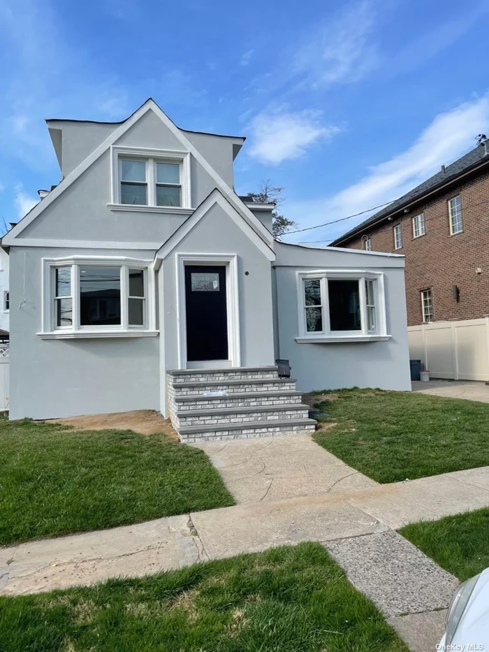 Beautiful Newly Renovated Duplex Featuring Living Room, Formal Dining Room, Eat in Kitchen w/Quartz Countertops, Stainless Steel Appliances, 3 Bedrooms, 2 Full Bathrooms and Laundry Room. Hardwood Floors Throughout. Includes 8 Split Unit A/C System, Alarm System, Video Surveillance, 1 Parking Spot and Side Yard. Convenient to Shopping & Transportation.