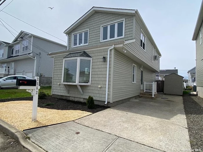 Recently Renovated,  New Bulkhead 9 Years Old. Waterfront Colonial, Mid Block Location, Minutes to Bay , Huge Master Suite, Walk In Closet, Beautiful Yard with Deck.