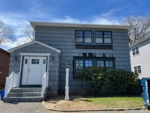 Second Floor Two Bedroom, 2.5 Bath Apartment with EIK and Spacious Living and Dining Rooms. Large Unfinished Basement w/Washer and Dryer and Plenty of Storage Space. Driveway Parking for 2 Cars. Shared Backyard, Separate Patio.