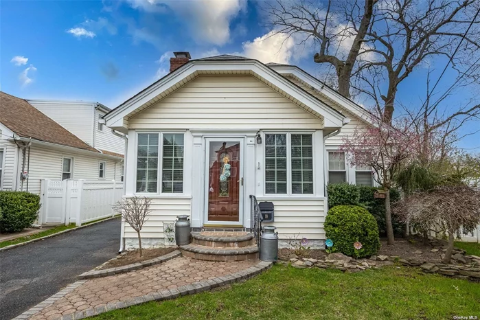 Welcome home to this warm and inviting Lynbrook bungalow. Perfectly placed on a quiet dead end street, this home is close to shopping, restaurants and a short walk to the Westwood LIRR station. This home features hardwood floors, granite countertops and a wood burning fireplace. Don&rsquo;t miss out, this one will not last.