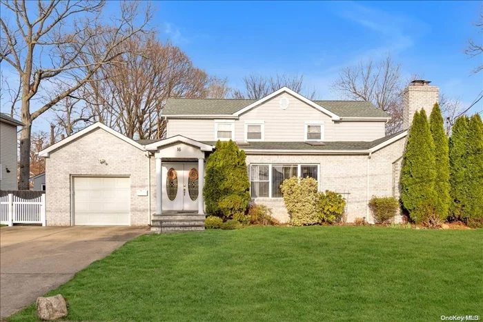 ROSLYN HEIGHTS. As you enter this move-in ready expanded ranch you&rsquo;ll notice it is flooded with sunlight throughout the day thanks to four skylights on the main level. Rooms flow seamlessly from an expansive living room into an adjacent family room with wood burning fireplace, which meets an open kitchen. The contemporary kitchen features a Subzero refrigerator along with stainless steel appliances and gray lacquer cabinetry which flows into a breakfast nook and dining area. Continuing on the main level find 3 bedrooms as well as a newly renovated full bath plus a powder room. A primary bedroom suite of grand proportions is located upstairs along with its own newly renovated primary bath offering both a frameless shower and soaking tub, complete with a huge walk-in closet. Home sits on a flat .25 acre on a quiet private street with a backyard accessible from 2 sliders opening onto a stone patio. Prime location with easy access to highways, bus and Roslyn LIRR train station.