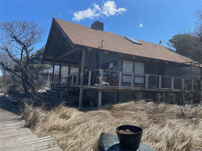 Open and spacious bayfront beach house located in a small Fire Island Community. Beautiful views of the Great South Bay and a short walk to the ocean. Quiet location with plenty of trees.