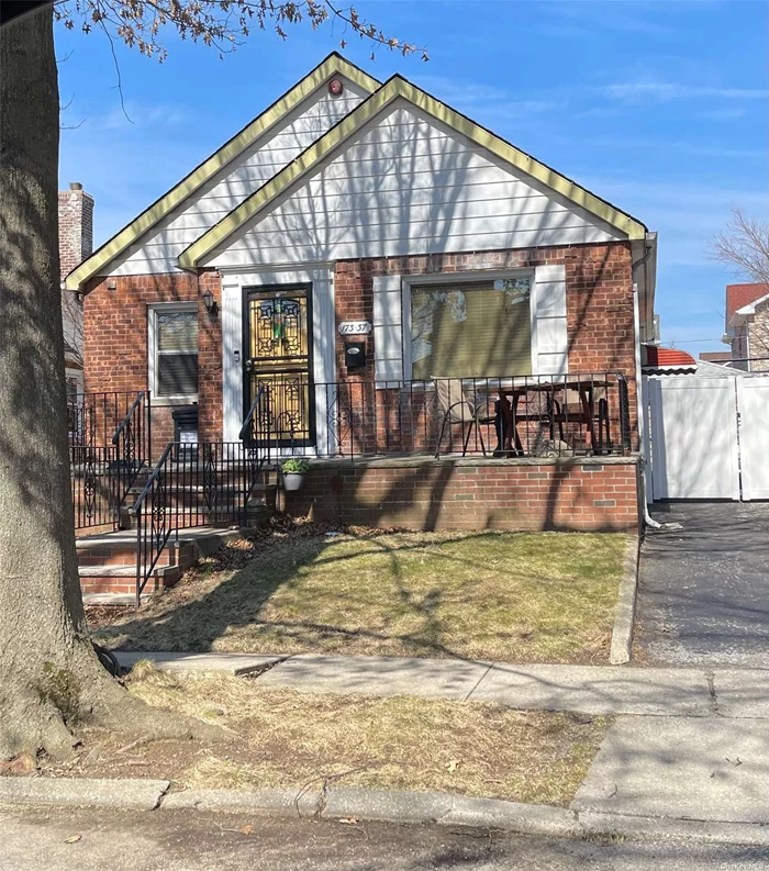 Detached Cape home on quiet street bordering Fresh Meadows/Auburndale. Great home to downsize or starter home on 40 x 100, great convenient block. Private driveway, nice sized yard, detached garage.