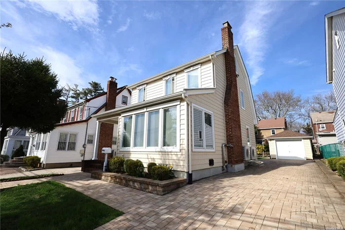 A Gem In The University Gardens Section Of Great Neck! This Completely Renovated Colonial Boasts All Updated Anderson Windows, Siding, Roof. The Interior Was Renovated Down To The Studs With Town Permits. As You Walk-In To This 3 Bedroom, 2.5 Bathroom and 1 Car Garage Home, You Are Welcomed By Beautiful Hard Bamboo Flooring And Open Concept Living Room, Dining Room and Kitchen With Heated Floors, Large Island And Stainless Steel Appliances Including Dishwasher, LG Refrigerator, Professional Gas Electrolux Icon Stove Top With Hood And Stainless Steel Splash Guard, Electrolux Icon Wall Oven And Microwave. The Dining Room Opens To The Back Yard Patio With Sliding Anderson Sliding Doors. A 1/2 Bath Completes The First Floor. On The 2nd Floor You Will Find The 3 Bedrooms, A Full Bath With Heated Floors, Separate Tub And Shower, Attic Access. The Full Finished Basement Has Heated Floors, A Full Bath, An Office With An Egress Window And Den Area. On Demand HW, 200 AMP Electric & More!