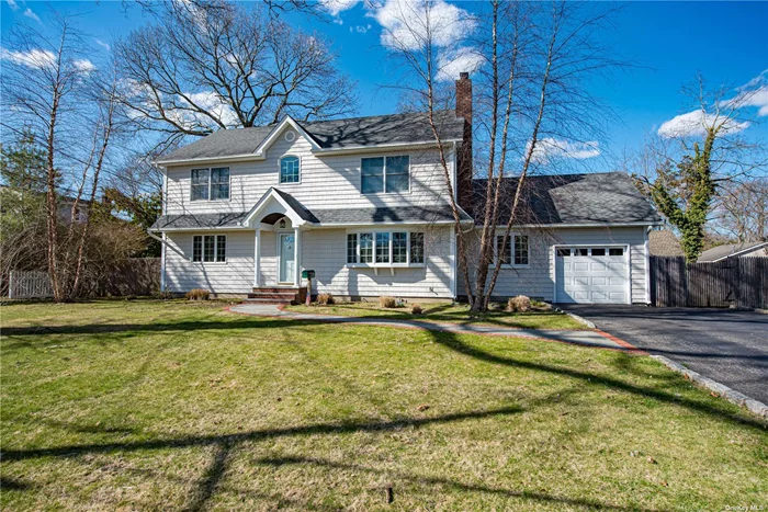 This South of Montauk side hall colonial features two bedrooms on the 1st level and four bedrooms on the 2nd level. Updated 200 amp electric, all Andersen windows, a large stand up 7 foot tall attic, full basement, natural gas service in the street, and the list goes on . . .