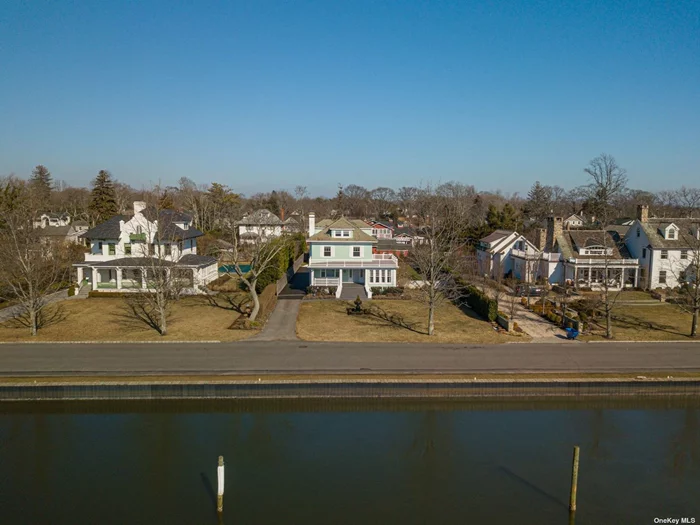 Newly Renovated In The Heart Of Brightwaters. New Windows, Baths & Kitchen. Enjoy The View From The Front Porch.