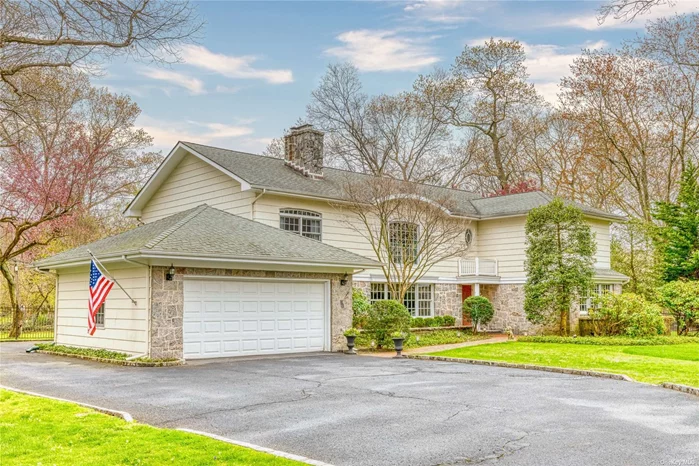 Pride of Ownership! This Elegant home features 5/6 beds, 4.5 baths, spanning over 4, 100 square feet of living space. A private entrance set on 2 flat acres in prestigious Muttontown. Two-story entry height in foyer, sun-filled formal living room w/ wood burning fireplace, large formal DR, home office, powder room, Large mudroom w/full bath, family room with open floor plan seamlessly connecting to gourmet kitchen w/ granite counters, center island, breakfast counter w/seating, stainless steel appliances. Second Floor features luxurious Primary suite w/ marble bathroom and walls of custom fitted closets. Addt&rsquo;l two bedrooms (jack and Jill) sharing a newly renovated full bath. 4th bedroom on the second floor w/brand new full bath, additional playroom/office. Beautiful manicured grounds include sprawling lawn area and large sunny backyard with in-ground heated pool. Whole house commercial grade generator. Fully Finished basement! Jericho SD