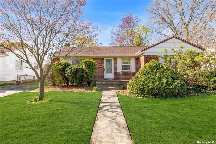 Perfect starter home with 3 bedrooms, updated full bath Eat in Kitchen with SS Appliances and Corian Counter Tops, Formal Dining Room, open to the Livingroom. hardwood floors as seen. A large, finished basement with Laundry Area and half Bath. Large yard. Roof 3 years old.