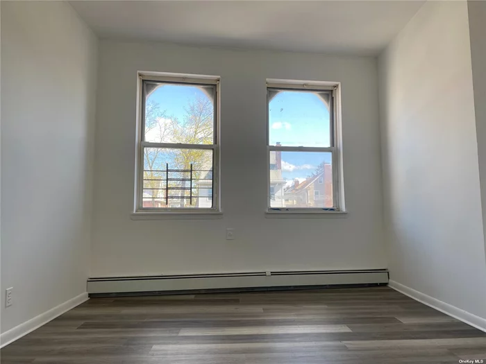 Convenient Location. Close To Public Transportation, Q28 To Downtown Flushing. Broadway LIRR To Manhattan, Couple Block To Northern Blvd & Utopia Parkway. This Sunny And Bright 3 Bedrooms 1 Bath Located On 2nd Floor Of A Mixed Used Property. Fresh Paint, New Floor, New Stove And New Refrigerator, Also New Windows Will Be Installed Next Week.