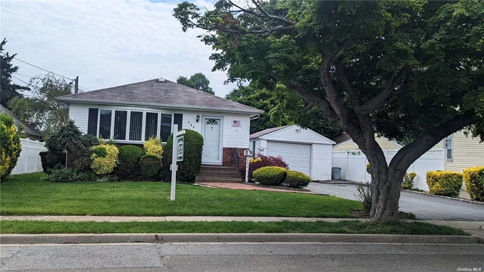Clean, well kept home with some updates in Massapequa w/Farmingdale Schools. CAC, 7 zone sprinkler system, 150 amp half finished basement, large det garage, mid block, quiet street. Updated kitchen w/garden window. Hardwood floors through main level. Side door to basement and gar/driveway and back door to yard. Washer works but as is w/$250 credit towards a new unit. Easy access to parkway or train for commuting. Local shopping nearby.