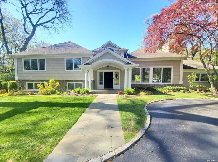 This sprawling, sunlit 6 bedroom, 4.5 bath residence is THE ONE for you !! Lush views of perhaps the two most magnificent acres in Harbor Acres are highlighted by expansive windows in every beautiful room. Stunning pool, whole house generator, beach rights. This home has it all. Do not wait!!