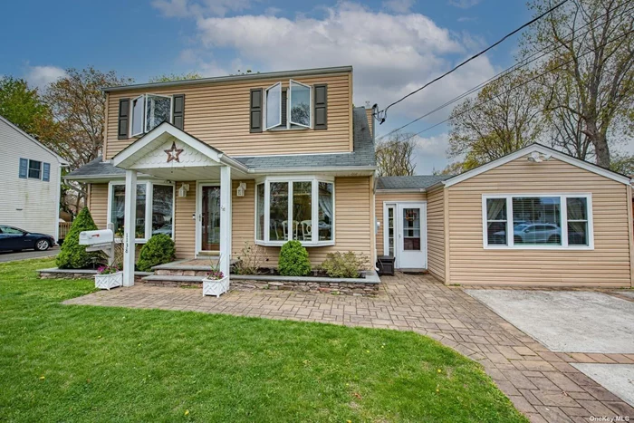 Welcome Home to this Gorgeous updated colonial! Spacious living room with hardwood floor & french doors to your private deck. Dining room & Eat-in-kitchen with granite countertops and stainless appliances & french doors to the deck. Perfect for entertaining. Laundry room, Den or playroom also has access to the fully fenced backyard. Located in the West Islip school district.