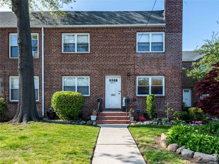 Living room, Master bedroom with double closet, Bedroom, Renovated full bath, Formal dining room, Kitchen, Door to yard. Private parking and garage included. Convenient to LIRR, highways, shopping.