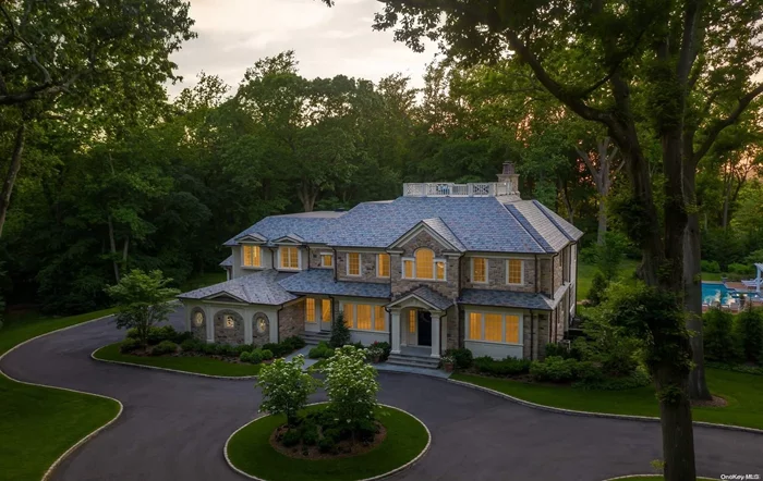 New Construction! Extraordinary Custom Stone Colonial located in the Prestigious 160 Acre Gated Community of Spring Hill at Old Westbury. Unparalleled Quality! Vermont Slate Roof, White Oak Plank Floors, 26&rsquo; Two Story Entrance Foyer, Detailed Moldings and Finishes Enhance Sophisticated and Beautifully Detailed Entertainment Rooms. Six Bedrooms En-suite plus a Lavish Primary Suite features a Sitting Room, Two Closet Rooms and Marble Master Bath. Library, Guest Wing, Four Fireplaces. The Lower Level offers Great Entertainment Space with an Attractive 1000 Bottle Glass and Mirror Wine Room, 75 TV, Professional 2-Lane Bowling Alley and Glass Enclosed Gym. Six Professional Landscaped Acres Offer Privacy and a Luxurious Outdoor Setting. Covered Porch, Expansive Patio and Beautiful Pool Setting. Property has been Prepared for a Tennis Court. Designed, Built and Landscaped by Kean Development. Gated and Manned Security, Lake and Boat House. Resort Lifestyle! Roslyn School District.