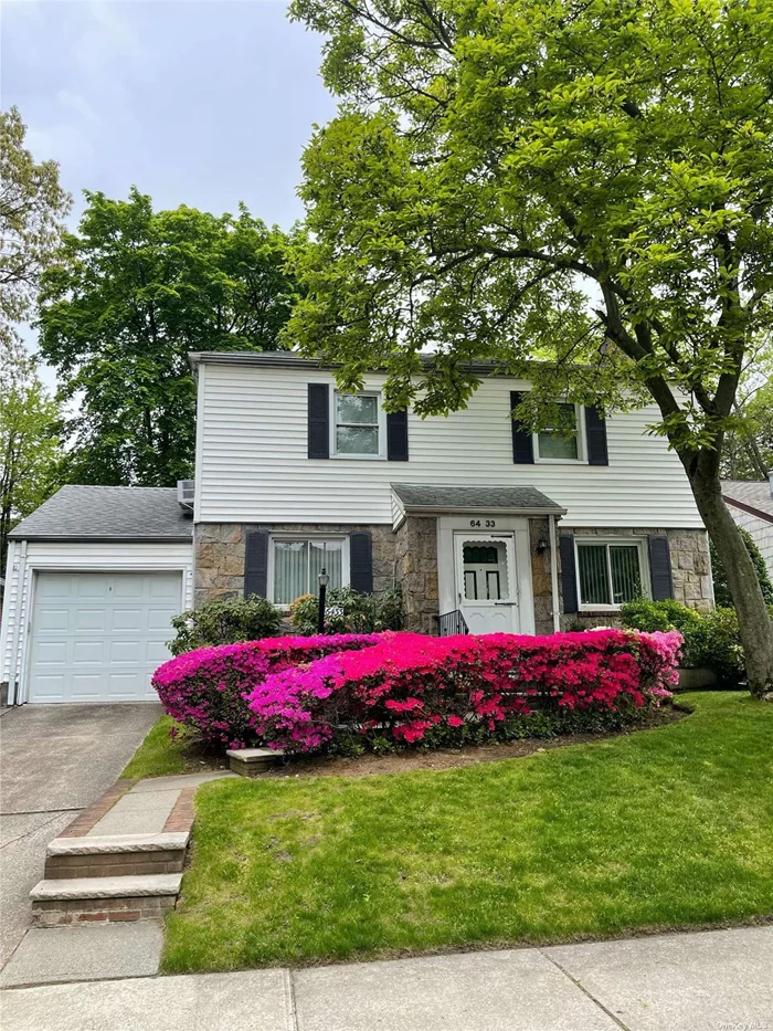 Welcome to this Beautiful Well Maintained 3 Bedrooms Colonial Home W 50x100 Lot in the desirable section of Oakland Gardens. building size of 30x22 plus 18x22 ( Legal extension with c/o). Finished Basement with 1 car garage, Beautiful Backyard, Eat In Kitchen, CAC,  Close to Shopping Center, Schools, Parks, Public Transportation and All. SD #26. Ps. 203, Is 74,