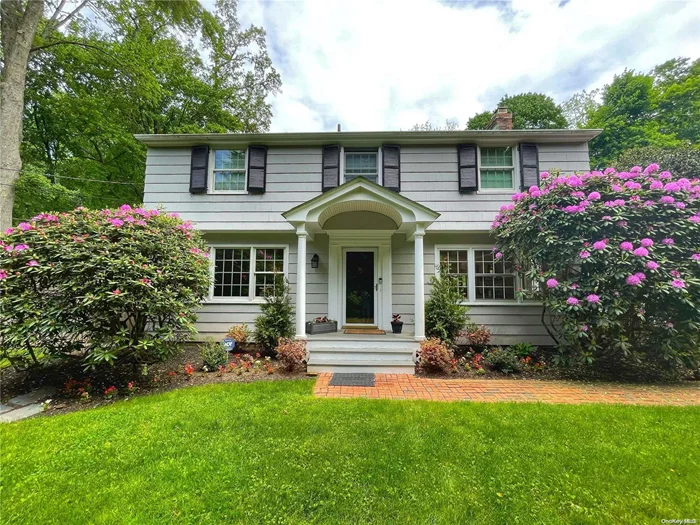 Classic 5-bedroom Center Hall Colonial set on a beautifully landscaped acre in East Norwich! This turnkey residence offers a gracious flow featuring a large LR with fireplace, formal DR, sun-drenched family room with custom media unit, large window and French door to the beautiful back yard . The spectacular new designer kitchen features a center island/breakfast bar, Carrera marble subway tile backsplash and glass doors to the expansive deck. The private property delights the senses with perennial gardens and magnificent pool and provides the perfect setting for family fun and exceptional entertaining. The unique feature of this beautiful home is the additional office/guest suite with separate entrance. This wing of the home has a bedroom, home or professional office, full bath and living room area! Finished basement with playroom, laundry room and ample storage. Updates include new windows, new roof on guest suite section, new pool pump, new CAC unit, Fido Fence..Walk to Preserve!!