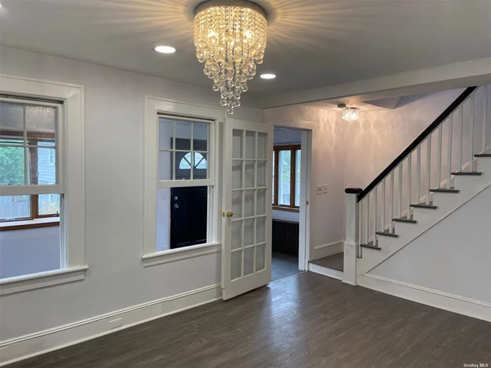 Newly renovated house with beautiful hardwood flooring throughout, oversized windows and high ceilings. The home features a newly installed chef&rsquo;s kitchen along with two marble baths.