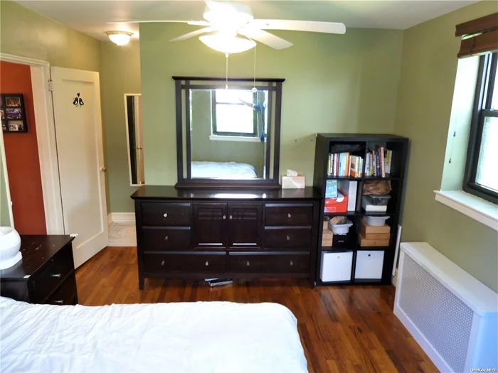 Sunny, Spacious, Corner 2BR with an Easy Walk To LIRR, Shops and Buses to Main Street.  Desirable, North Flushing/Auburndale Location with Top Schools in SD#25. King-Size MBR with Huge, Walk-In-Closet provides Easy Storage. Nicely Tiled Bath and Original Wood Floors Thru-out. Very Large Cook&rsquo;s Kitchen With Lots of Potential. Good Size 2nd BR in Bright Corner w 3 Exposures and 8 Windows. Easy Access to Washer/Dryer Available on Site. No Flip Tax. Convenient and Close to Everything - Walk to Francis Lewis, Northern Blvd and Utopia Shops, Buses, Grocery, and Schools. COMMUTER&rsquo;S DREAM- Auburndale LIRR, only 26 mins to Manhattan and New East Side LIRR Stop Coming Soon!